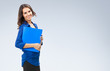 © vgstudio - Businesswoman with blue folder