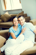 © vgstudio - Cheerful smiling young attractive couple, indoors