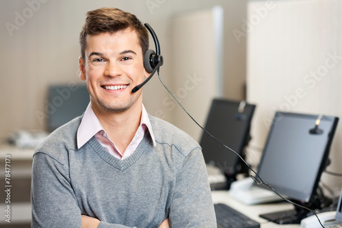 Customer Service Representative With Headset In Call Center Poster