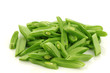 bunch of cut string beans on a white background