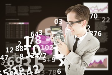 Poster - Composite image of geeky smiling businessman showing calculator
