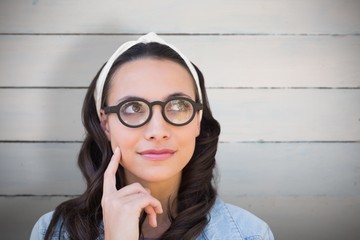 Poster - Composite image of thinking brunette