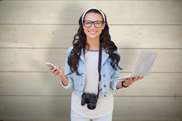 Poster - Composite image of pretty brunette with laptop