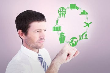Poster - Composite image of businessman pointing with his finger