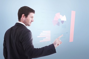 Poster - Serious businessman standing and pointing the finger