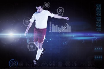 Wall Mural - Composite image of football player in white kicking