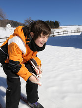Young Boy For First Time With Cross-country Skiing