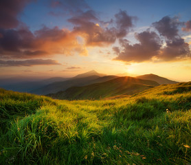 Wall Mural - mountain valley during bright sunrise