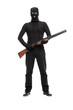 © Ljupco Smokovski - Masked terrorist holding a shotgun