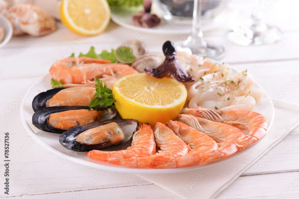 Tasty seafood on plate on table close-up