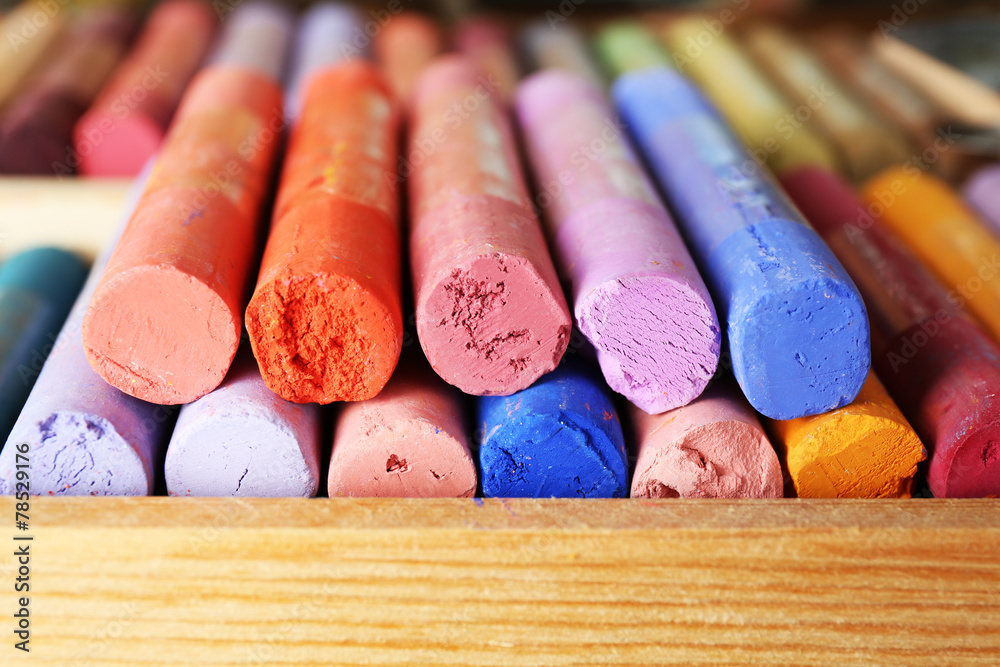 Colorful chalk pastels in box close up