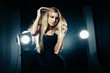 © julenochek - Beautiful woman posing at studio in light flashes