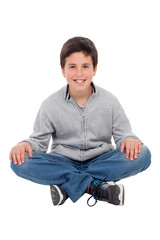 Sticker - Smiling preteen boy sitting on the floor