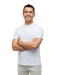 © Syda Productions - smiling man in white t-shirt with crossed arms