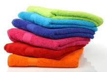 Colorful Stacked Bathroom Towels On A White Background