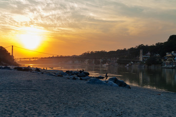 Sticker - View of River Ganga and Ram Jhula bridge at sunset