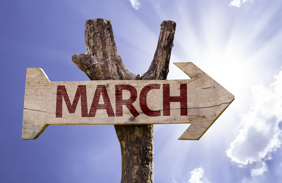 March sign with sky background