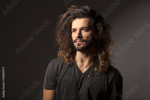 Handsome Young Man With A Beard And Long Hair Kaufen Sie