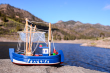 Blue Fishing Boat Figurine