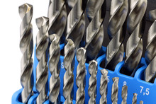 Set Of Hardened Steel Metal Drill Bits In A Blue Plastic Box On 