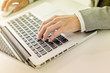 © Nonwarit - Closeup of businessman hands typing on laptop computer