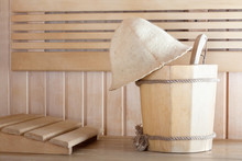 Traditional Wooden Sauna For Relaxation With Bucket Of Water