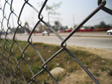 Iron Net Fence On Backdrop Background
