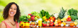 Woman witn Vegetables over green background.