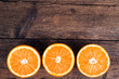 Fresh oranges on wooden background