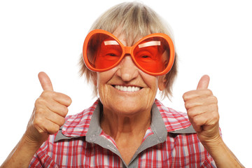 senior woman wearing big sunglasses