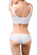 © chettythomas - Woman with perfect slim body in white underwear isolated on