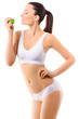 © chettythomas - Slim woman in white underwear with green apple at her hands over