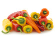 © tpzijl - Red,yellow and orange sweet pepper (capsicum) on a white backgro