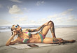 © olly - Tattooed girl at the seaside