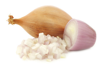 fresh shallot and a cut one on a white background