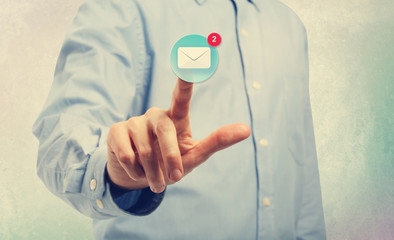 Sticker - Young man pointing at an email icon