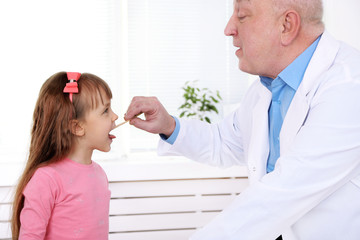 Poster - Little girl and old doctor in hospital