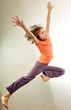 portrait of child  jumping and dancing