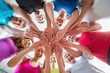 © WavebreakmediaMicro - People stacking hands at health club