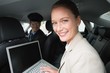 © WavebreakmediaMicro - Businesswoman being chauffeured while working