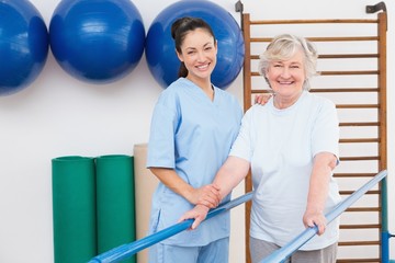 Senior woman and therapist looking at camera