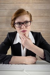 Poster - Composite image of thinking redhead businesswoman