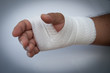 Hand injury,male hand wearing white bandage