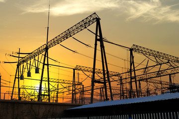 Wall Mural - transmission tower in the sunset