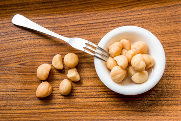 Macadamia in the white dish