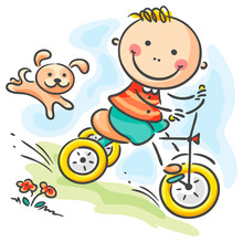 Boy Riding His Tricycle