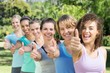 © WavebreakMediaMicro - Fitness group smiling at camera