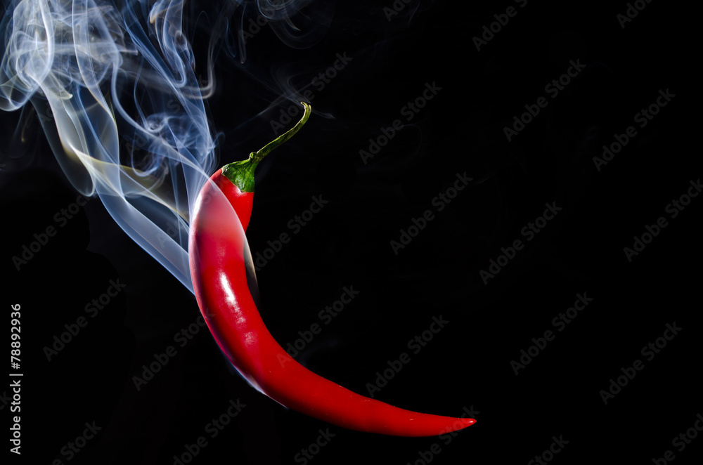 Smoking red hot chili pepper on black background - obrazy, fototapety, plakaty 