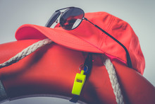 Hat Glasses Whistle And Lifesaver Lifeguard Equipment Summer Safety Concept