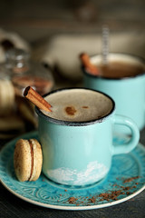 Wall Mural - Tasty cappuccino on table, close-up